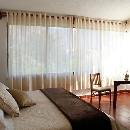 Hotel Quinta Del Sol เตโปซตลัน ภายนอก รูปภาพ