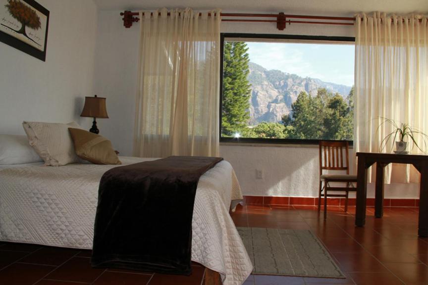 Hotel Quinta Del Sol เตโปซตลัน ภายนอก รูปภาพ