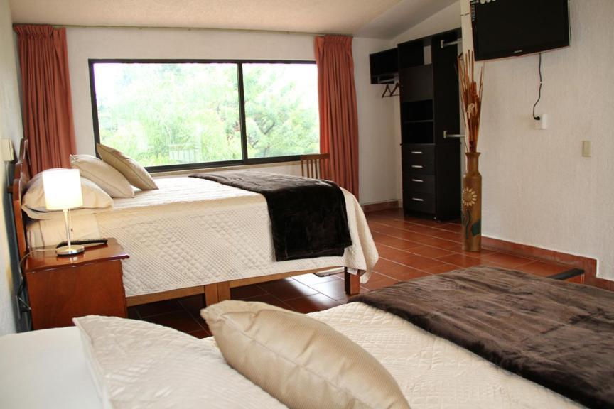 Hotel Quinta Del Sol เตโปซตลัน ภายนอก รูปภาพ