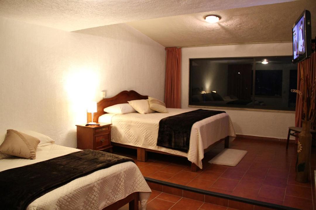 Hotel Quinta Del Sol เตโปซตลัน ภายนอก รูปภาพ
