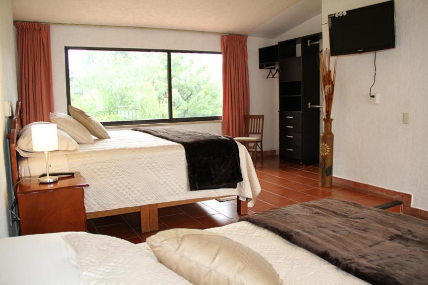 Hotel Quinta Del Sol เตโปซตลัน ภายนอก รูปภาพ