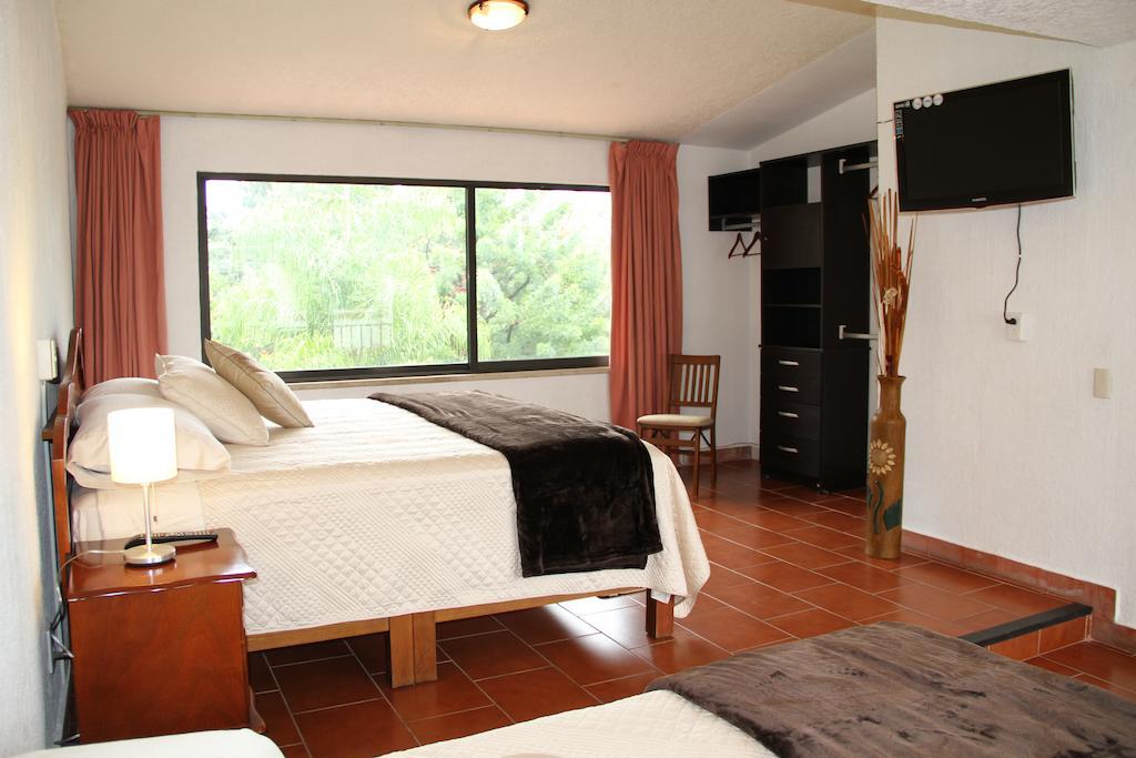 Hotel Quinta Del Sol เตโปซตลัน ห้อง รูปภาพ