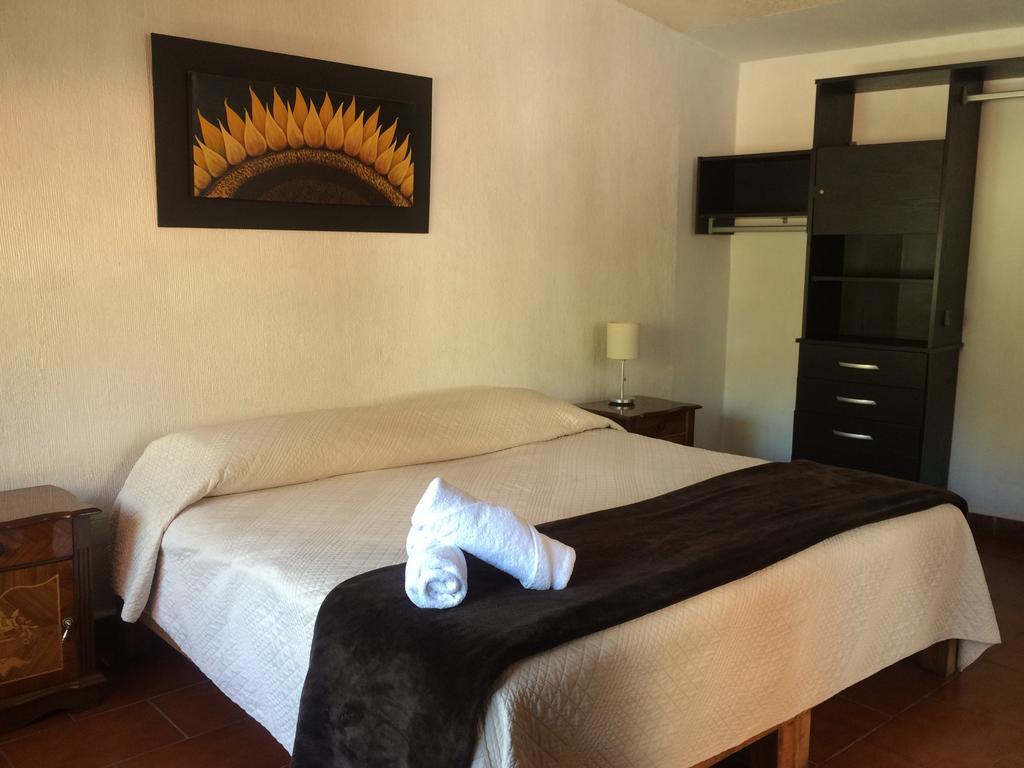 Hotel Quinta Del Sol เตโปซตลัน ภายนอก รูปภาพ